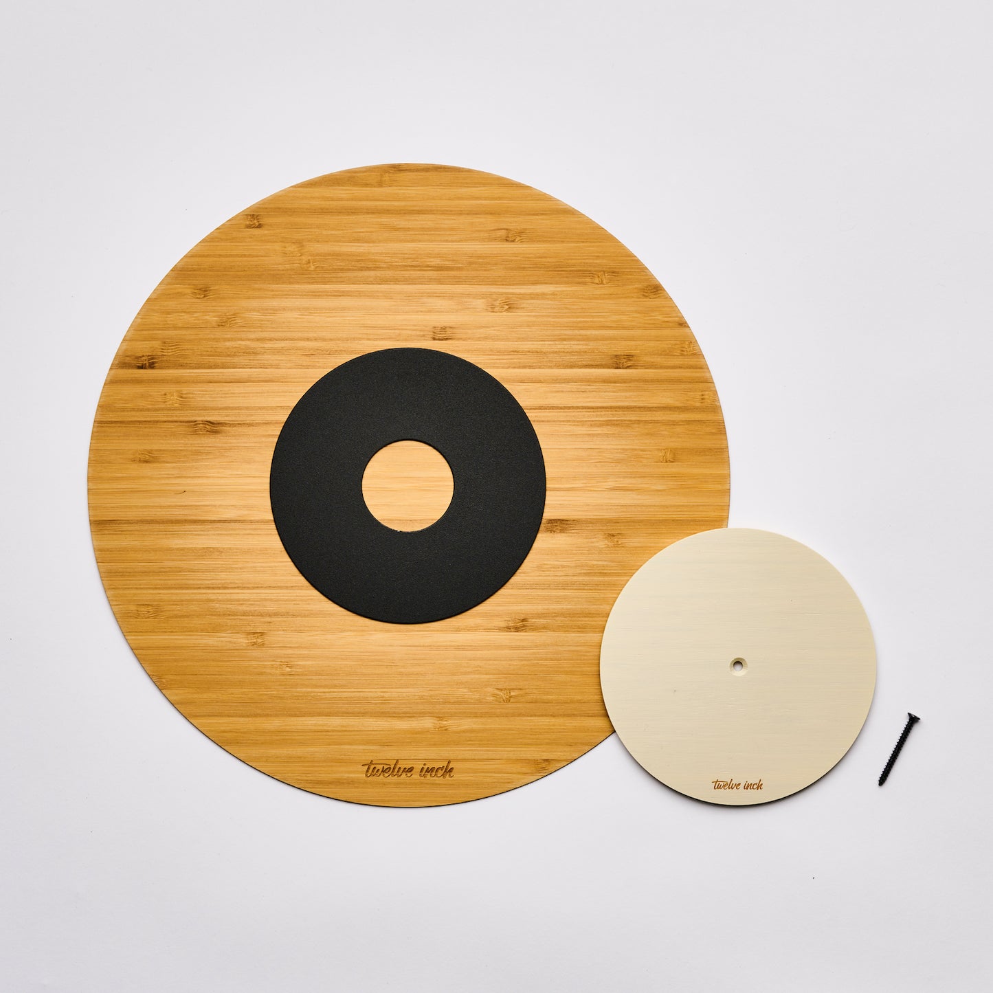 Small and big Twelve Inch disc in white, with the black screw