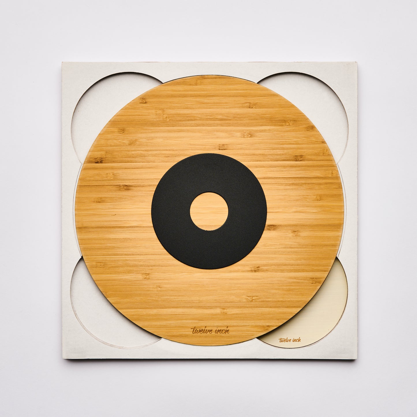 Small and big Twelve Inch disc in white, with the black screw