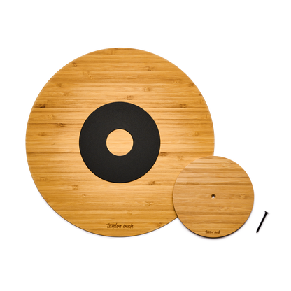 Small and big Twelve Inch disc in natural, with the black screw