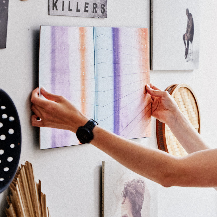 A gatefold album being displayed on the wall with a pair of Twelve Inch Original