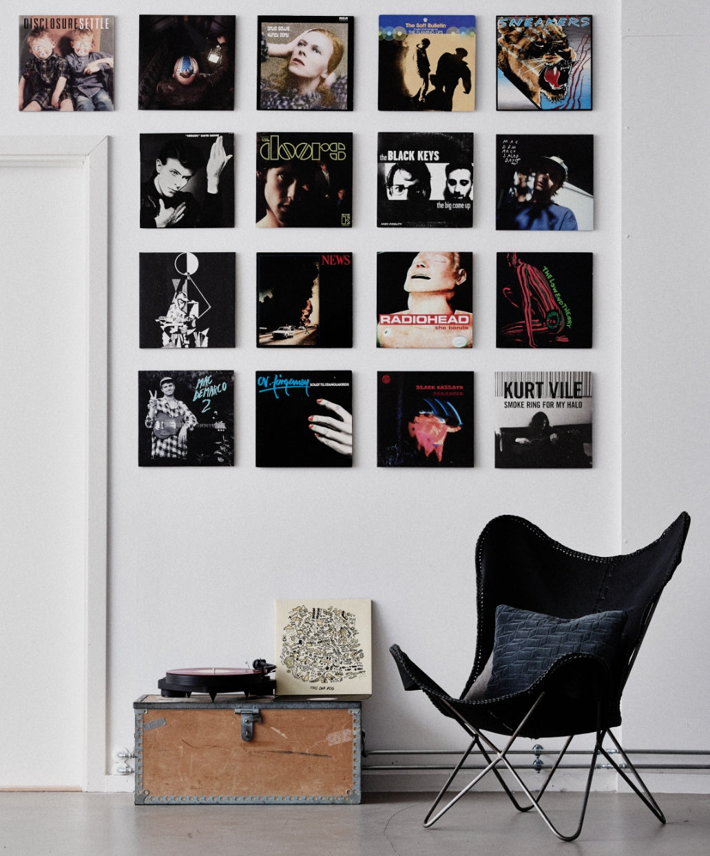 Big album art gallery mounted on the wall with the Twelve Inch Original, in a minimalist room
